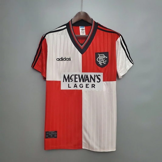 Chequered Red and white Rangers Away football jersey from 1995/96 with Adidas logo and McEwan's Lager branding on a gray background