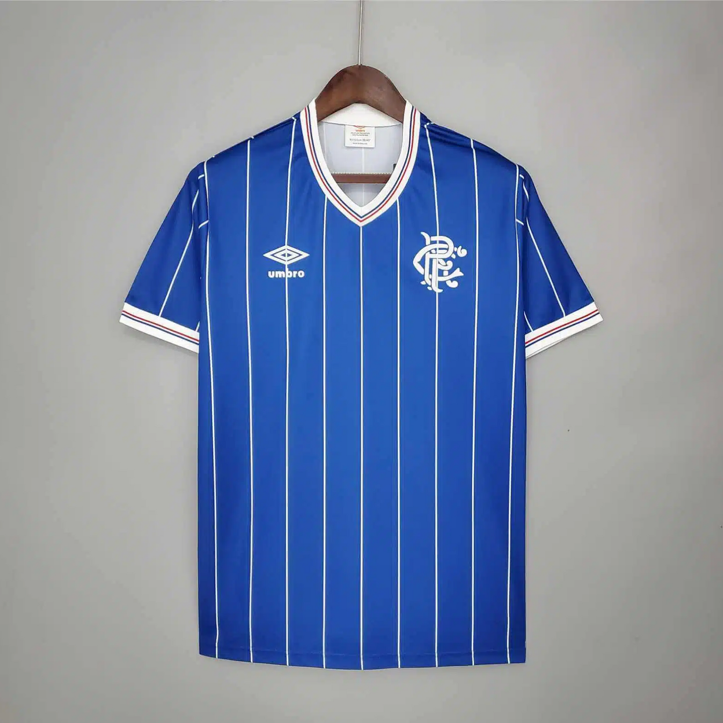 Blue striped Rangers sports jersey from 1982/83 made by Umbro